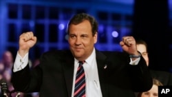 FILE - New Jersey Gov. Chris Christie celebrates his election victory in Asbury Park, Nov. 5, 2013. 