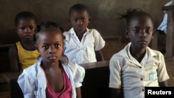 Children attend a class session at the Wangata commune school during a vaccination campaign against the outbreak of Ebola, in Mbandaka in the Democratic Republic of Congo, May 23, 2018.