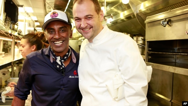 Chefs Marcus Samuelsson and Daniel Humm (right) are shown in 2015. (Photo by Mark Von Holden/Invision for James Beard Foundation/AP Images)