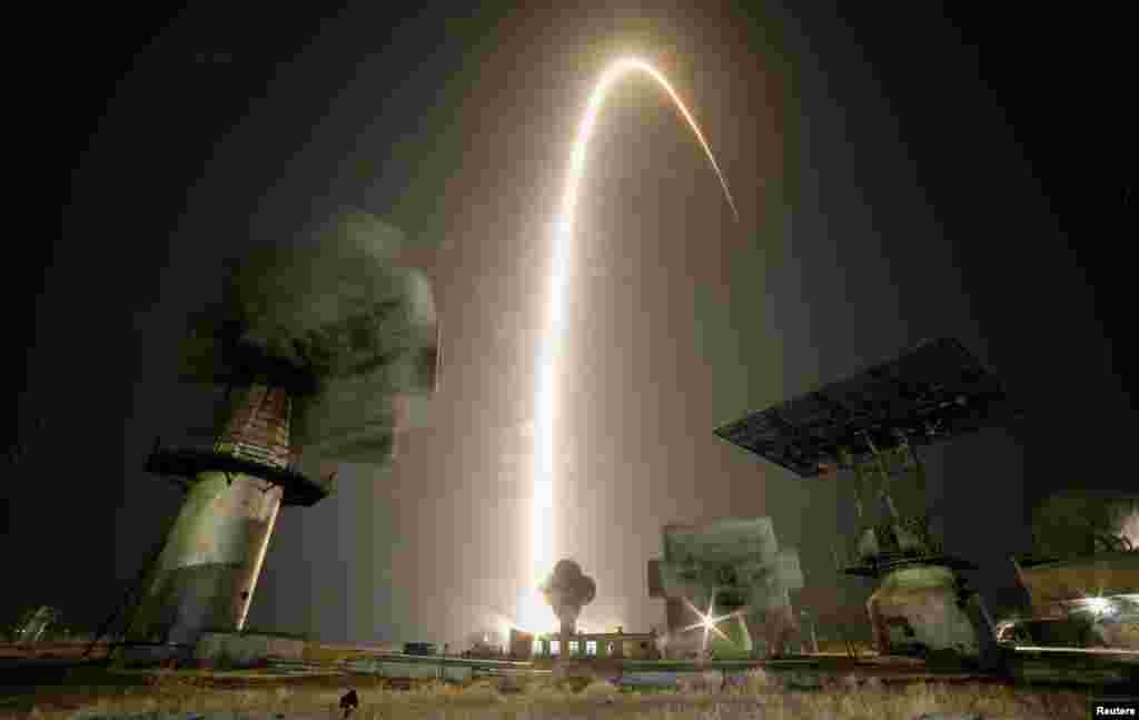 The Soyuz MS-08 spacecraft carrying the crew of astronauts Drew Feustel and Ricky Arnold of the U.S. and crewmate Oleg Artemyev of Russia blasts off to the International Space Station (ISS) from the launchpad at the Baikonur Cosmodrome, Kazakhstan, March 21, 2018.