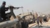 이라크 군, 모술 인근서 참수 시신 100여구 발견