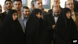 Marzieh Vahid Dastgerdi, center, is seen during a press conference when she was nominated as health minister by Iranian President Mahmoud Ahmadinejad in 2009.