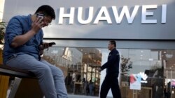 VOA Asia - Trump delays action against Huawei