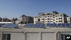 Solar energy panels are seen on the roof top of Shifa hospital in Gaza City, set up recently to provide electricity to the ICU at the hospital as an alternative power source, March 26, 2012. 