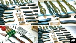 The Syrian official news agency SANA shows weapons that were found in the province of Homs, Syria, September 27, 2011.