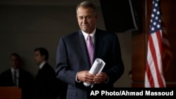 House Speaker John Boehner of Ohio arrives for a news conference on Capitol Hill in Washington, Feb. 6, 2014. Boehner said it will be difficult to pass immigration legislation this year. 