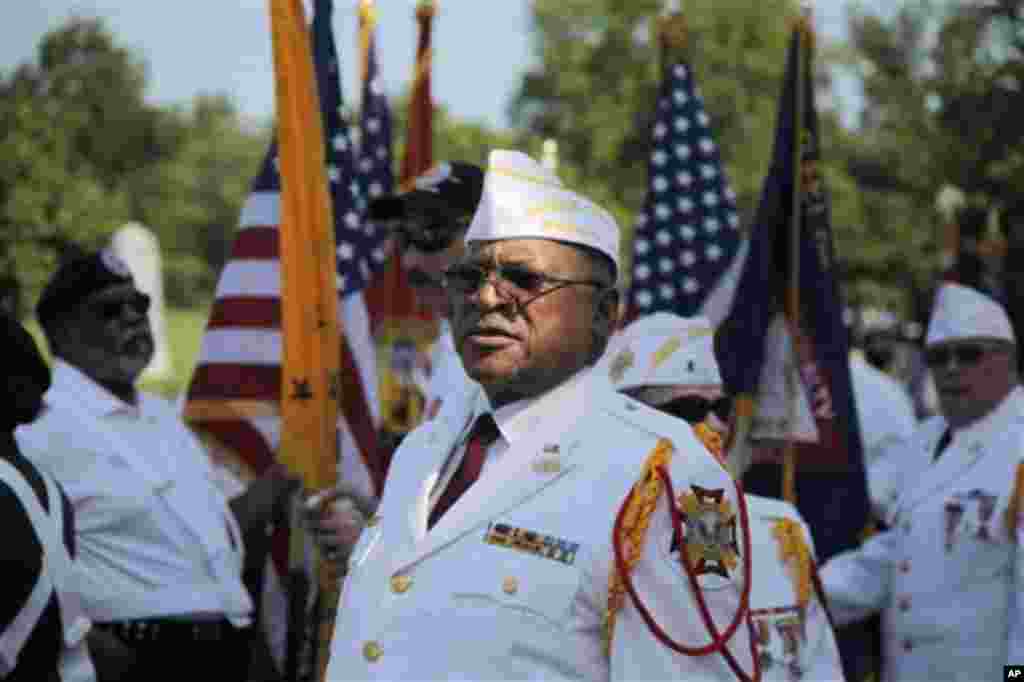 Ret. Air Force Maj. Alfred Nathaniel Simmons, from Baltimore, Md., lines up with other members of the Veterans of Foreign Wars honor guard at the Memorial Day Observance ahead of President Barack Obama's arrival at the Memorial Amphitheater at Arlington N