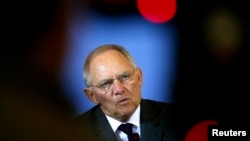 Germany's Finance Minister Wolfgang Schaeuble addresses a news conference in Berlin in this March 25, 2013 file photo. 
