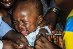 Vaksinasi malaria di Ndhiwa, Kabupaten Homabaya, Kenya Barat, 13 September 2019. (AFP)