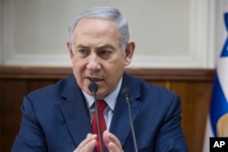 Israeli Prime Minister Benjamin Netanyahu attends a cabinet meeting in Jerusalem, Jan. 28, 2018.