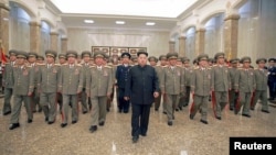 FILE - North Korean leader Kim Jong Un visits the Kumsusan Palace of the Sun to mark the 21st anniversary of the death of founder Kim Il Sung in this undated picture released by North Korea's Korean Central News Agency, July 8, 2015.