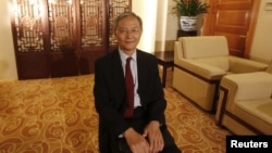 Zhong Jianhua, China's special Envoy to Africa, poses for a photograph during an interview with Reuters at the Ministry of Foreign Affairs in Beijing, July 16, 2012.