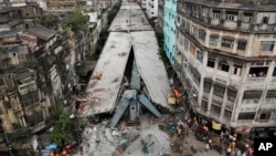 General view shows a partially collapsed overpass in Kolkata, India, April 1, 2016. 