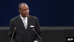 Le président guinéen Alpha Condé s'adresse aux députés lors d'une session plénière au Parlement européen, le 29 mai 2018, à Strasbourg, dans l'est de la France.