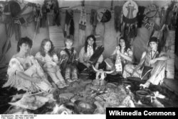 A group of citizens of former Czechoslovakia portraying Native Americans at an "Indianistik" meeting in 1988. Indian hobbyism--the desire to dress or live like traditional Native Americans--has always been popular in Eastern Europe.
