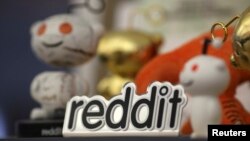 FILE - Reddit mascots are displayed at the company's headquarters in San Francisco, California.