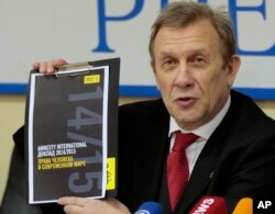 FILE - Sergei Nikitin, director of Amnesty International representative office in Russia.