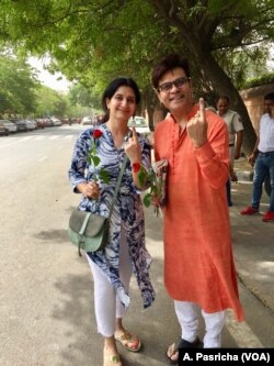 Many in India like this couple in New Delhi said that it is important to cast one's vote.