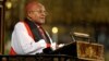 FILE - Archbishop Desmond Tutu speaks during a memorial service for former South African President Nelson Mandela at Westminster Abbey in London, March 3, 2014. (John Stillwell/Pool/Reuters)