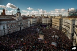 People fill the main square of Madrid during a march by members of the Podemos party, which hopes to emulate the electoral success of Greece’s Syriza party in elections later this year, Jan. 31, 2015.