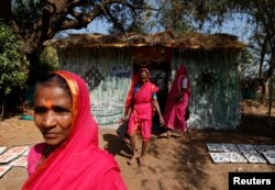 Women leave after attending Aajibaichi Shaala (Grandmothers' School) in Fangane village, India, Feb. 20, 2017.