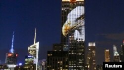 An image of an animal is projected onto the Empire State Building as part of an endangered species projection to raise awareness, in New York, Aug. 1, 2015. 