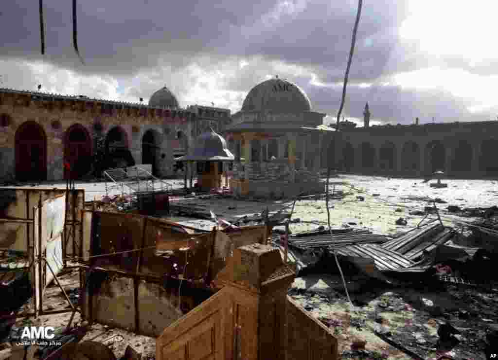 This citizen journalism image provided by Aleppo Media Center shows the famed 12th century Umayyad mosque in Aleppo, which was damaged by shelling, May 13, 2013. 