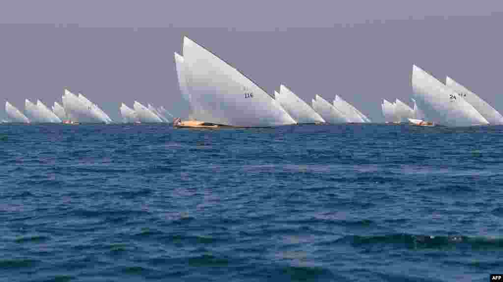 Competitors sail their boats in the annual long-distance &quot;60ft Dubai Traditional Dhow Sailing Race&quot; in the United Arab Emirates, March 7, 2020.