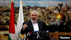 FILE - Hamas Chief Ismail Haniyeh gestures as he delivers a speech in response to U.S. President Donald Trump's decision to recognize Jerusalem as the capital of Israel, in Gaza City, Dec. 7, 2017.