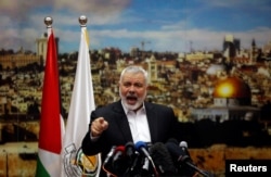 Hamas Chief Ismail Haniyeh gestures as he delivers a speech over U.S. President Donald Trump's decision to recognize Jerusalem as the capital of Israel, in Gaza City, Dec. 7, 2017.