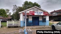 The Blue Front Cafe, in Bentonia, Mississippi. The Blue Front is owned by local blues musician Jimmy "Duck" Holmes. It has hosted many blues musicians over the years.