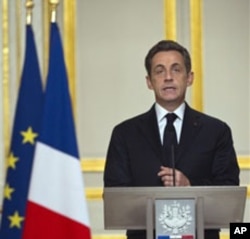 French President Nicolas Sarkozy delivers a speech, March 19, 2011 at the Elysee Palace in Paris after a crisis summit on Libya
