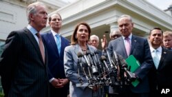 Speaker of the House Nancy Pelosi of Calif., talks with reporters after meeting with President Donald Trump about infrastructure, at the White House, April 30, 2019, in Washington.