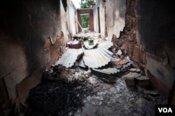 A house that was burned down in a suspected herdsman attack is pictured in Nimbo, Nigeria, May 4, 2016. (C. Stein/VOA)