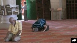 Muslim men pray in the al Aqsa compound in Jerusalem.
