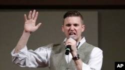 FILE - In this Dec. 6, 2016, photo, Richard Spencer, who leads a movement that mixes racism, white nationalism and populism, speaks at the Texas A&M University campus in College Station, Texas.