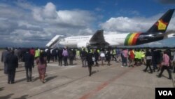 Some of the people who thronged Robert Gabriel Mugabe International Airport to have a glimpse of the Boeing 777.