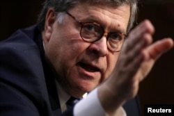 FILE - William Barr testifies before a Senate Judiciary Committee hearing on his nomination to be attorney general of the United States on Capitol Hill in Washington, Jan. 15, 2019.