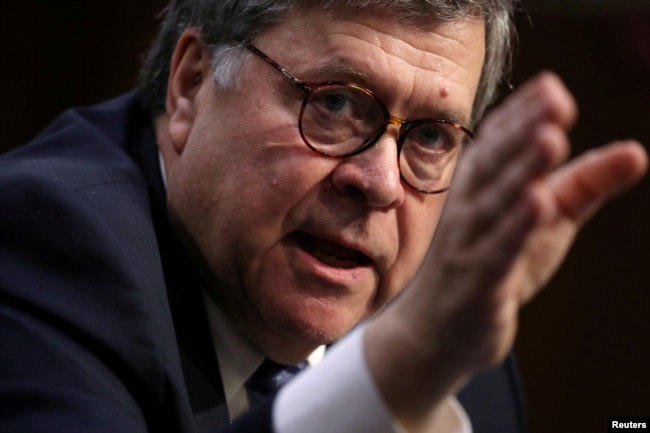 FILE - William Barr testifies before a Senate Judiciary Committee hearing on his nomination to be attorney general of the United States on Capitol Hill in Washington, Jan. 15, 2019.