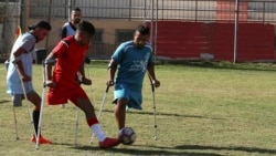 Palestinian amputees play a soccer match while using their crutches during a training session, organized by the International Committee of the Red Cross with the Palestinian Amputee Football Association, at Palestine Stadium in Gaza City, Sunday, Dec. 5,