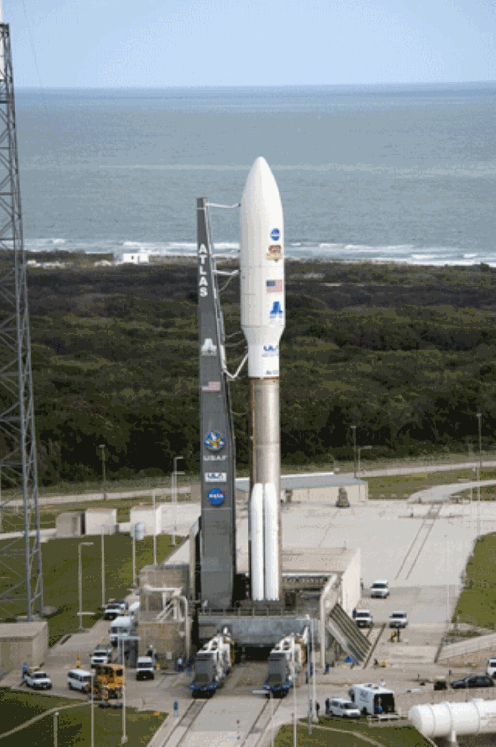 The 60-meter-tall Atlas V rocket arrives on the launch pad at Space Launch Complex-41 near the Atlantic Ocean. (NASA/Tony Gray)