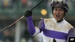 Jockey Mario Gutierrez reacts after riding I'll Have Another to victory in the 138th Kentucky Derby horse race at Churchill Downs Saturday, May 5, 2012, in Louisville, Kentucky.