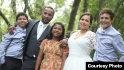 Ched Nin and his wife on their wedding day with their children. (Courtesy Photo of RELEASE MN 8)