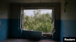 A room in a hospital, which was damaged during fighting between the Ukrainian army and pro-Russian separatists, is seen in Avdiyivka near Donetsk, Sept. 8, 2014.