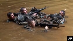 Soldiers from the U.S. Army's 25th Infantry Division 1st Stryker Brigade Combat Team participate in jungle warfare training at Schofield Barracks, Hawaii, March 1, 2017.