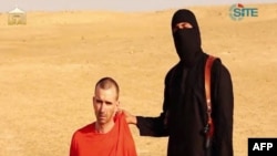 FILE - British aid worker David Haines in an image taken from a video released by the Islamic State group (IS), Sept. 2, 2014.