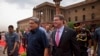 U.S. Defense Secretary Ashton Carter, right, walks with Indian Defense Minister Manohar Parrikar after receiving a ceremonial welcome in New Delhi, India, Wednesday, June 3, 2015