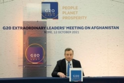 Italian Prime Minister Mario Draghi is seen during a press conference at the end of a G-20 virtual summit on Afghanistan, in Rome, Italy, Oct. 12, 2021.