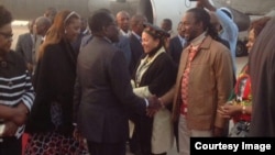 President Robert Mugabe with First Lady Grace Mugabe greeting some cabinet ministers and close relatives recently soon after his arrival from the United Nations General Assembly in New York. Partly obscured (left) is Vice President Joice Mujuru.