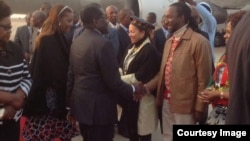 President Robert Mugabe with First Lady Grace Mugabe greeting some cabinet ministers and close relatives recently soon after his arrival from the United Nations General Assembly in New York. Partly obscured (left) is Vice President Joice Mujuru. (File Photo)